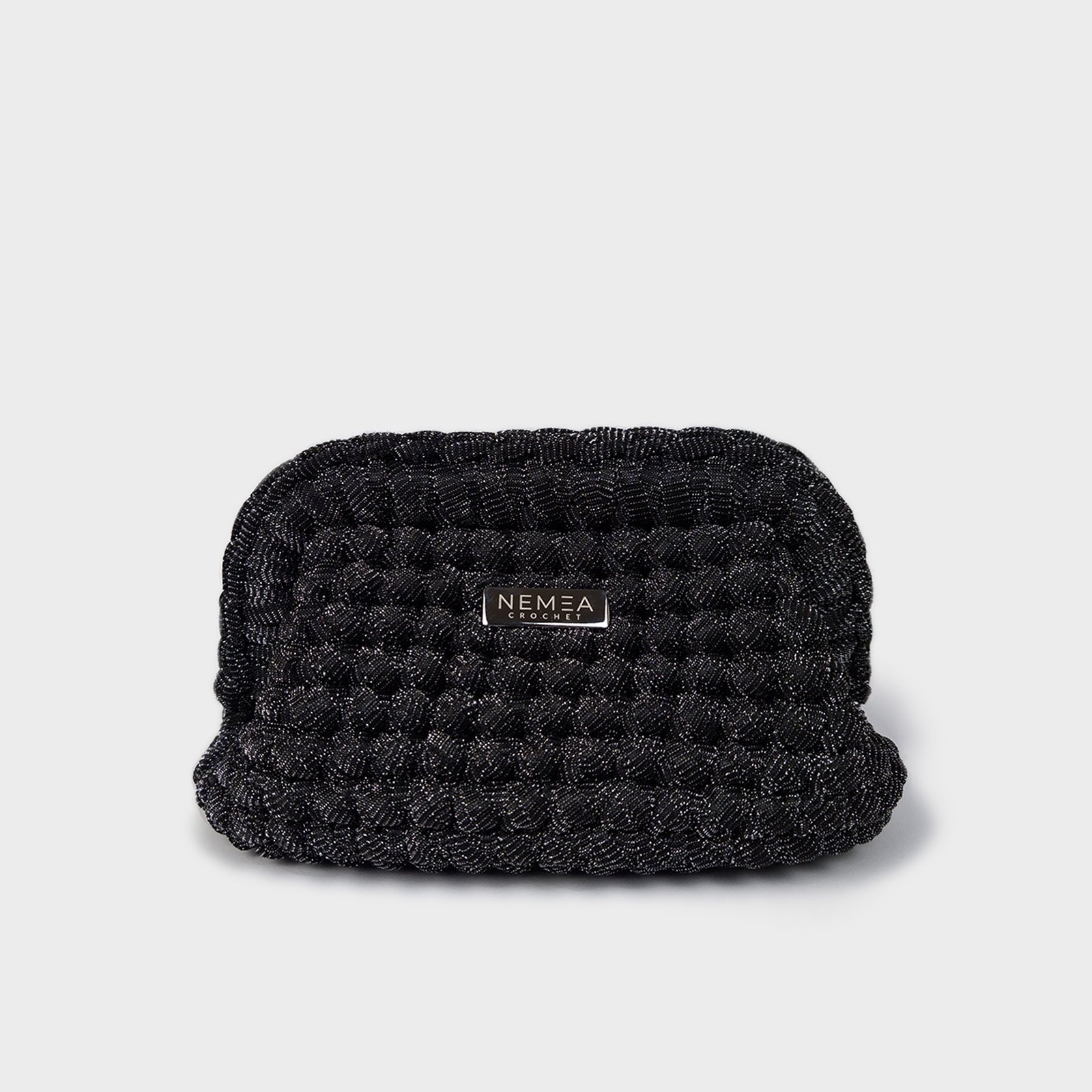 OSSIDIANA clutch bag